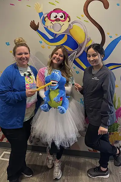Salisbury Pediatric Dentistry's staff in a tooth fairy dress  with dental hyegeinist at NC Pediatric Dentistry 