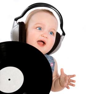 Baby boy Wearing Headphones With Record