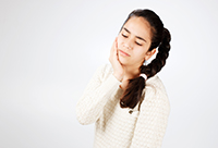 Girl wth tooth pain